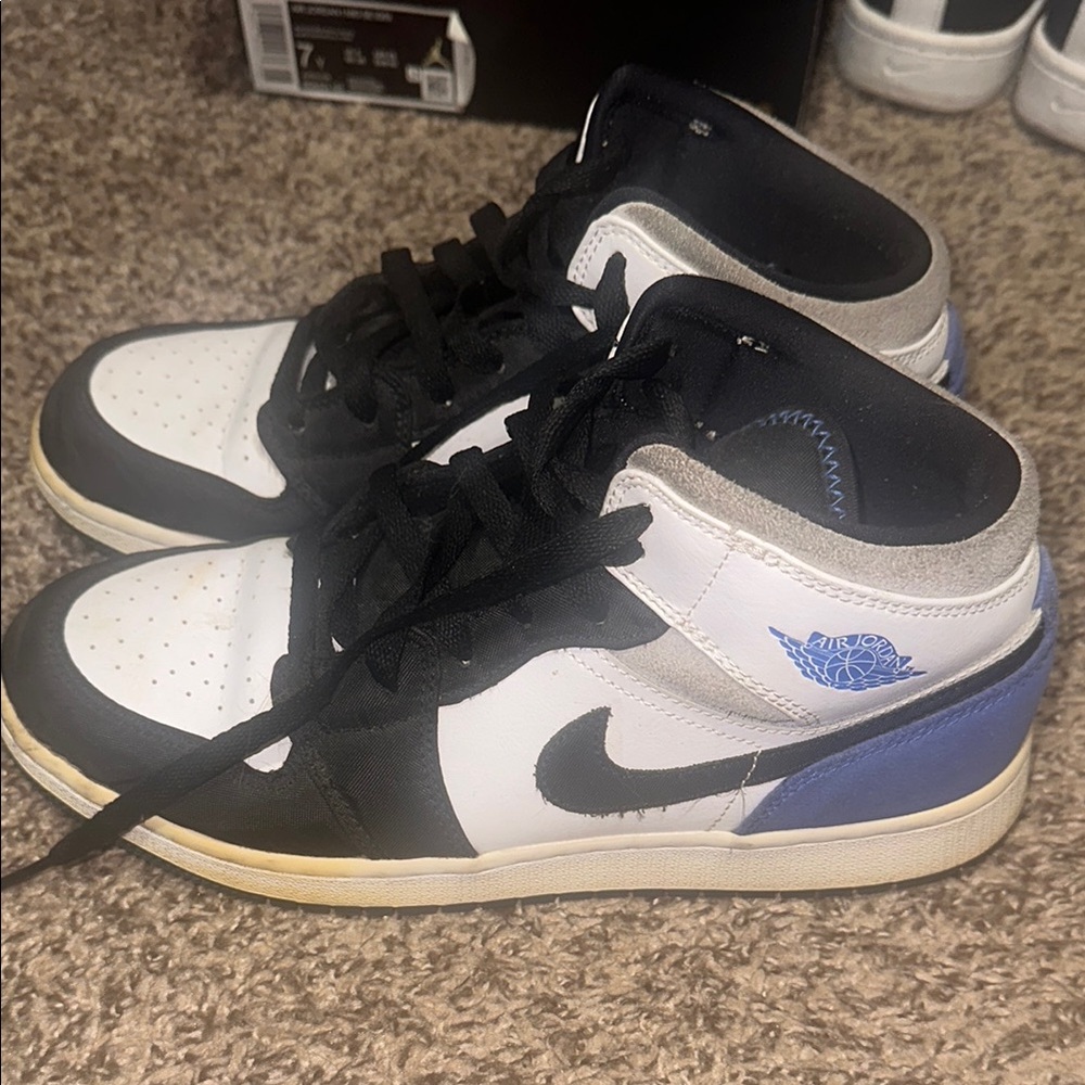Black and White Sneakers with Blue Accents